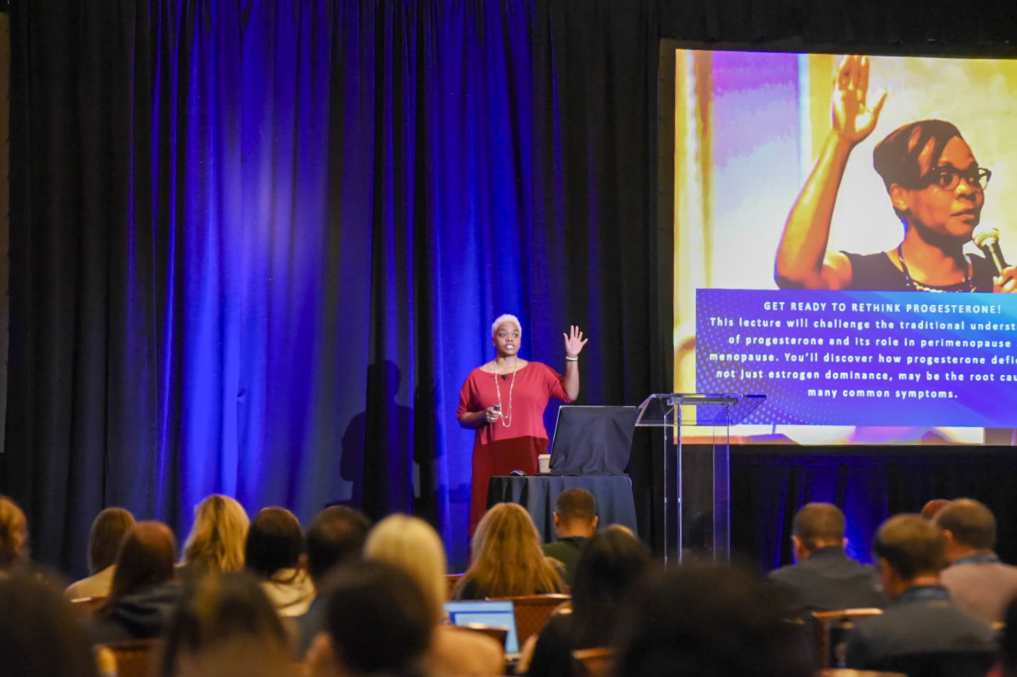 Dr. LaKeischa presenting on rethinking progesterone in midlife